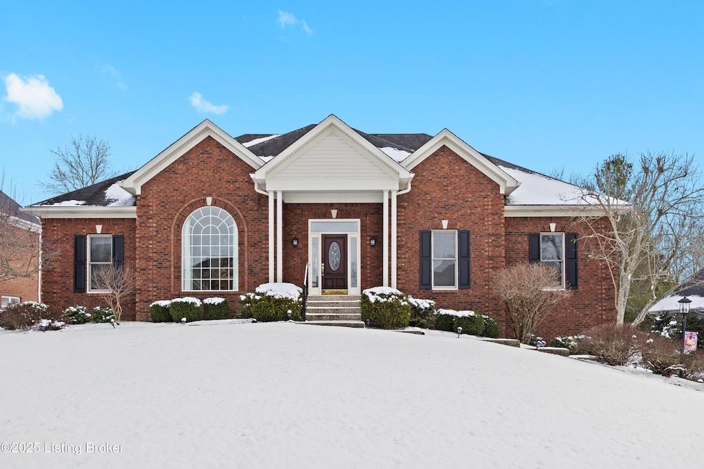 view of front of property with brick siding