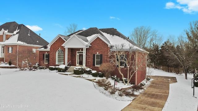 view of front facade featuring brick siding