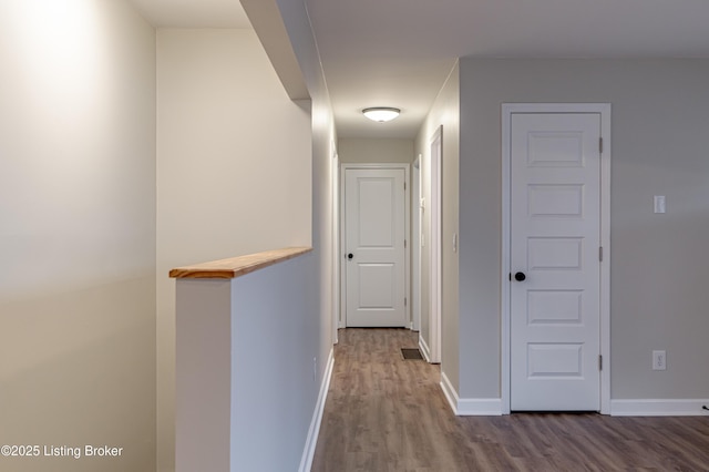 hall featuring wood-type flooring