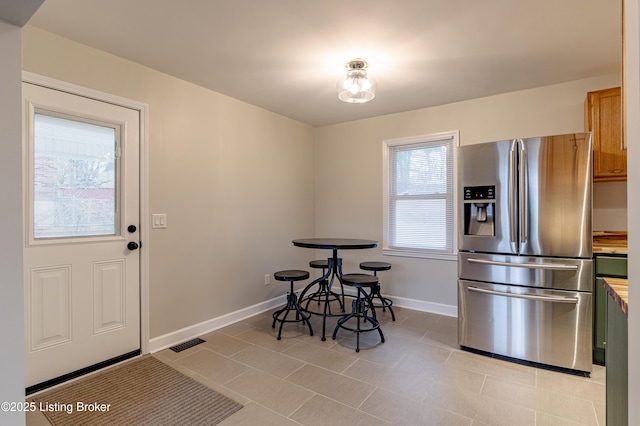 view of tiled dining space