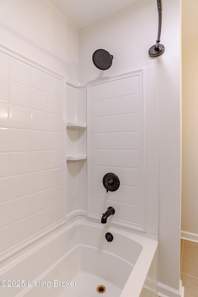 bathroom with shower / tub combination
