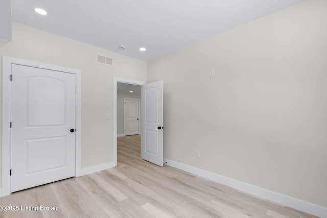 unfurnished bedroom with recessed lighting, baseboards, visible vents, and light wood finished floors