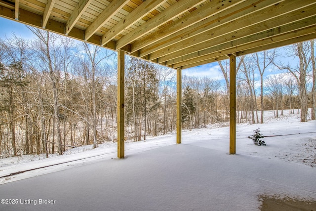 view of yard covered in snow