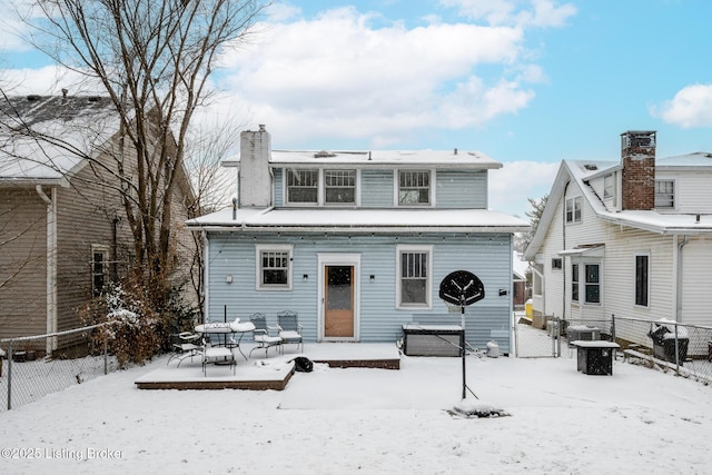 view of snow covered house