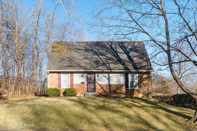 cape cod home featuring a front yard, brick siding, and entry steps