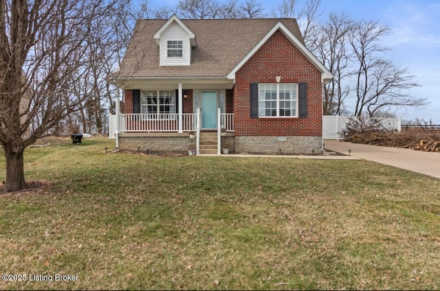 view of front facade with crawl space, a front lawn, a porch, and brick siding