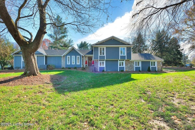 view of front of property with a front lawn