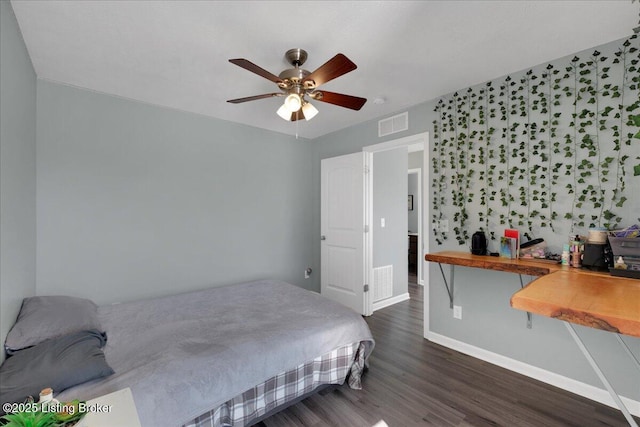 bedroom featuring ceiling fan and dark wood-type flooring