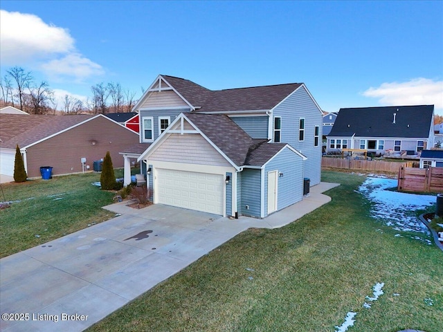 view of front facade featuring a garage and a front yard