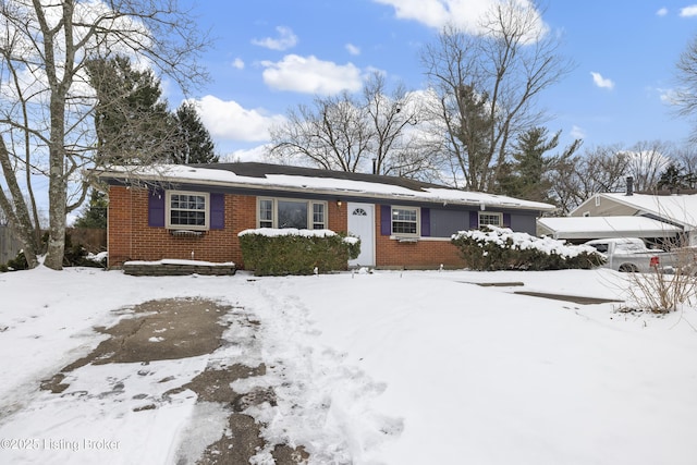 single story home with brick siding