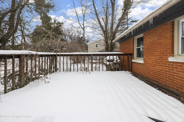 view of snow covered deck