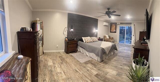 bedroom featuring a wall mounted air conditioner, light wood-type flooring, crown molding, and access to exterior