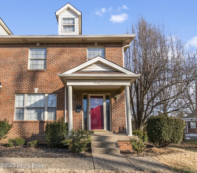 view of front of property with brick siding