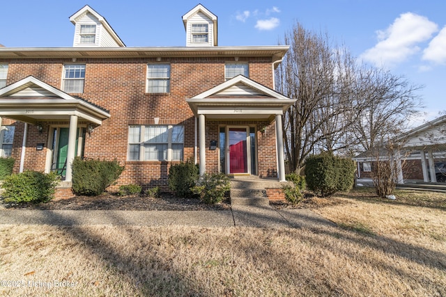 view of front of home with brick siding