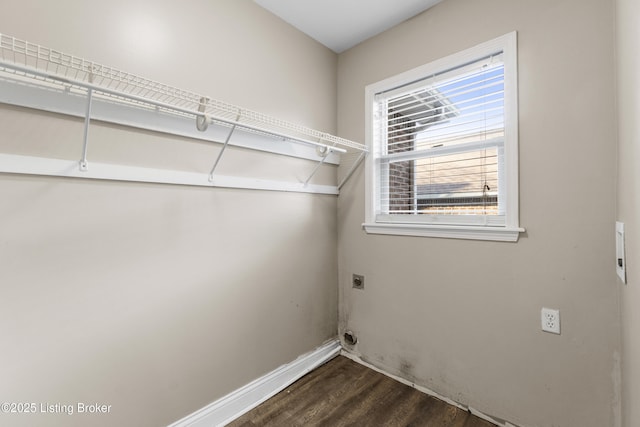 washroom with laundry area, dark wood finished floors, electric dryer hookup, and baseboards