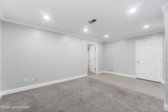 empty room with ornamental molding, recessed lighting, visible vents, and baseboards