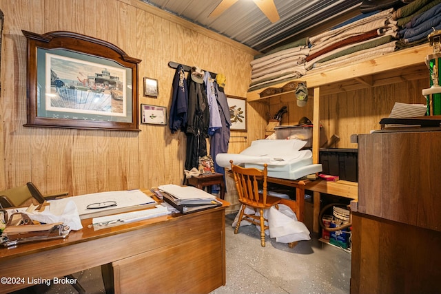 home office featuring concrete flooring