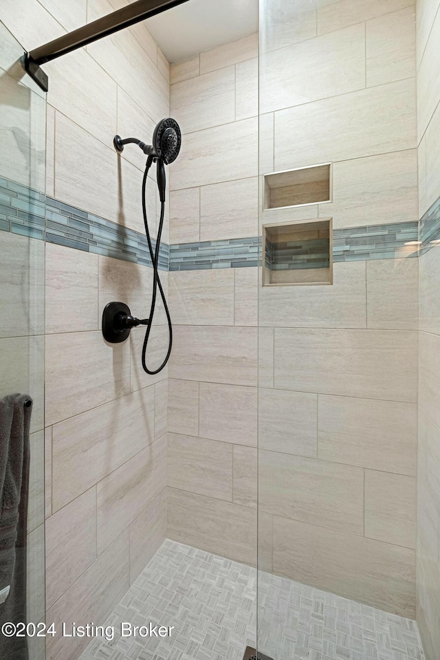 full bathroom featuring a stall shower