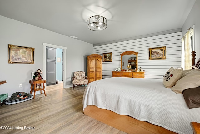 bedroom featuring light wood-style flooring