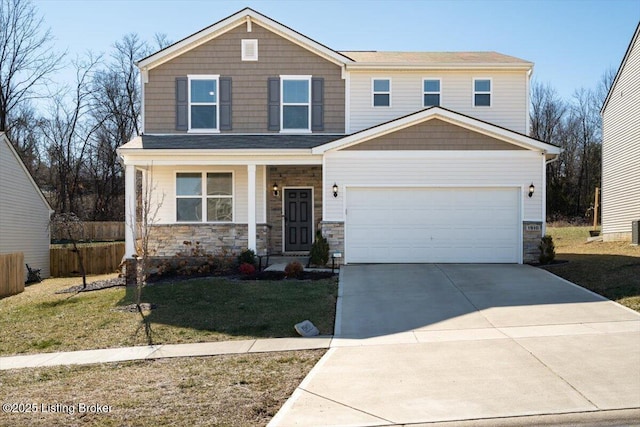 view of front facade featuring a front yard and a garage