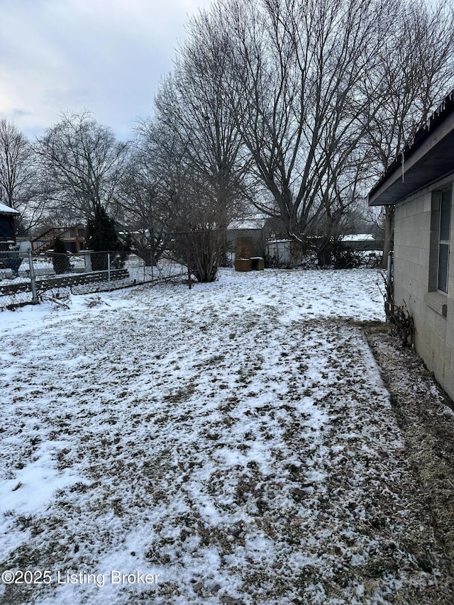 view of yard covered in snow