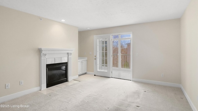 unfurnished living room with light carpet