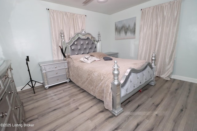 bedroom with hardwood / wood-style floors