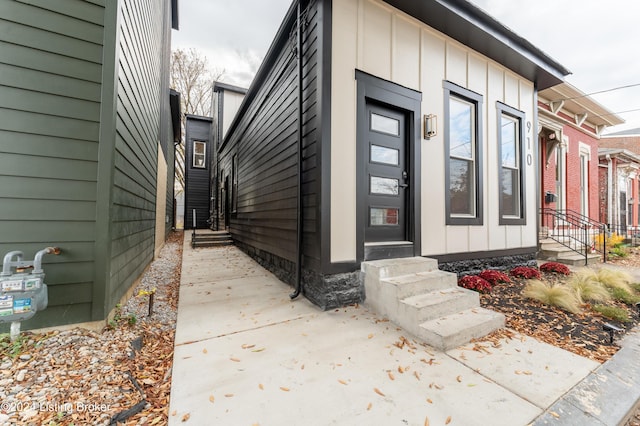 property entrance with board and batten siding