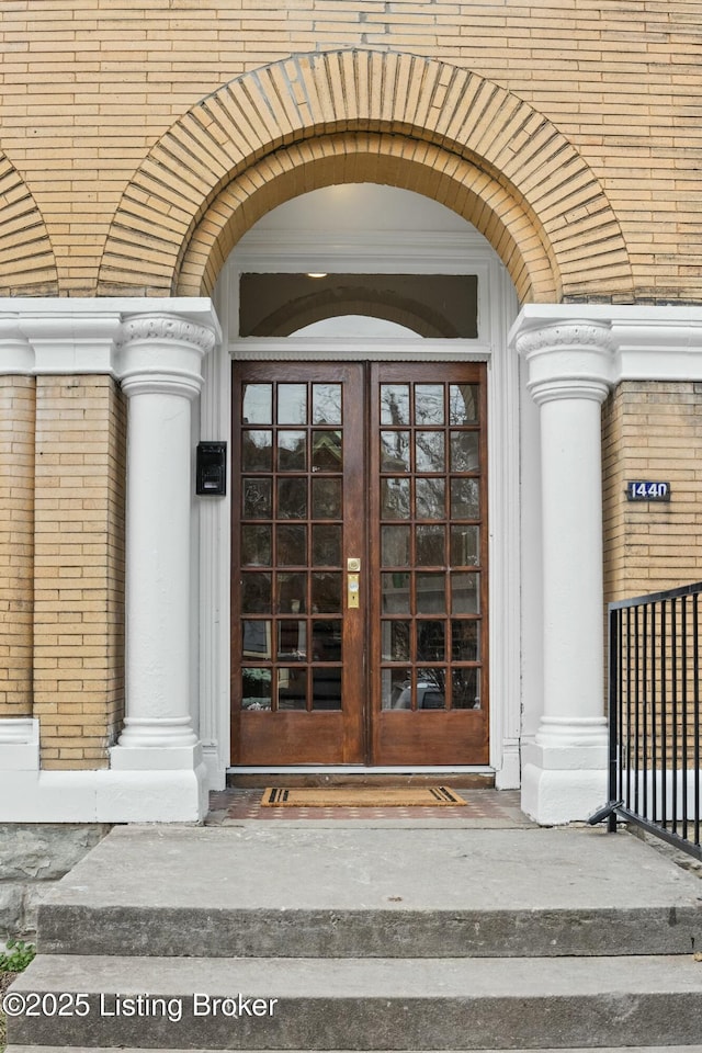 doorway to property featuring french doors