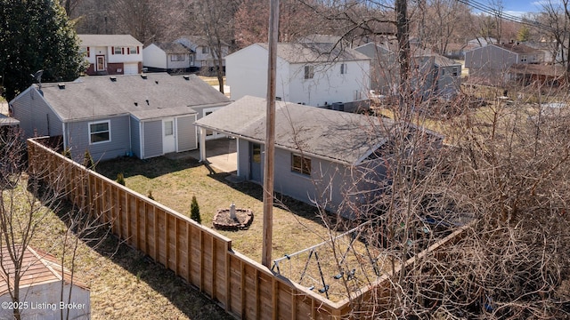 birds eye view of property with a residential view