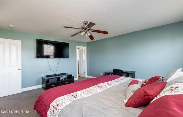 bedroom featuring a textured ceiling, carpet floors, a ceiling fan, and baseboards