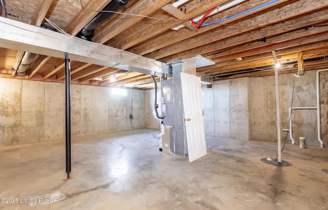 unfinished basement with heating unit