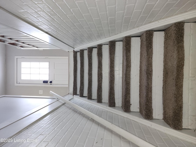 stairs featuring lofted ceiling