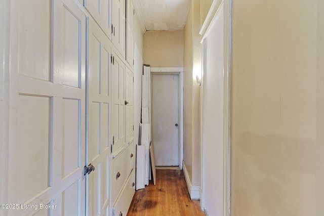 hallway with wood finished floors