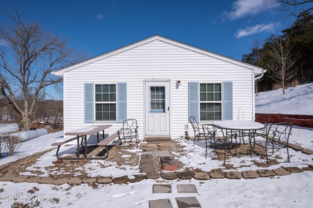 view of snow covered property