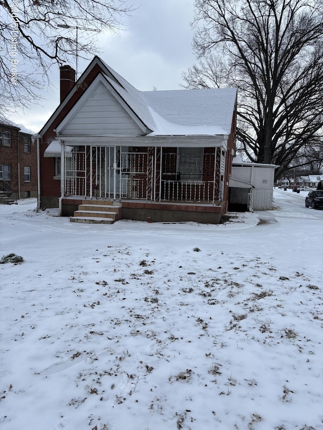 view of front of property with a chimney