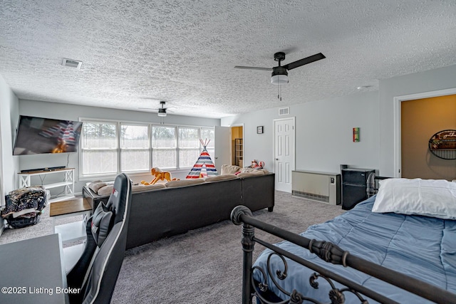 bedroom featuring light carpet, ceiling fan, and visible vents