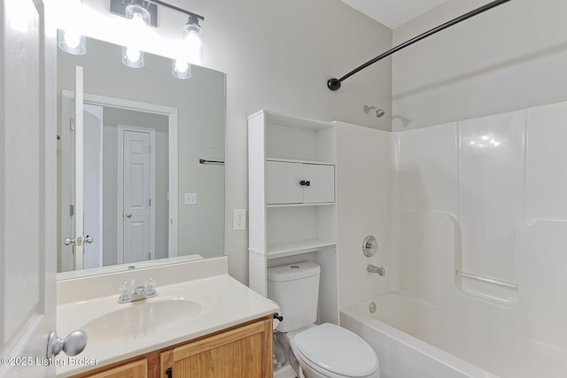 full bath with toilet, bathing tub / shower combination, and vanity