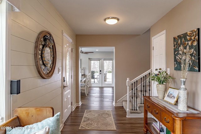 entryway with stairs, baseboards, dark wood-style flooring, and french doors