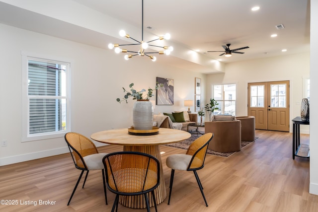 dining area featuring baseboards, visible vents, an inviting chandelier, recessed lighting, and light wood-type flooring