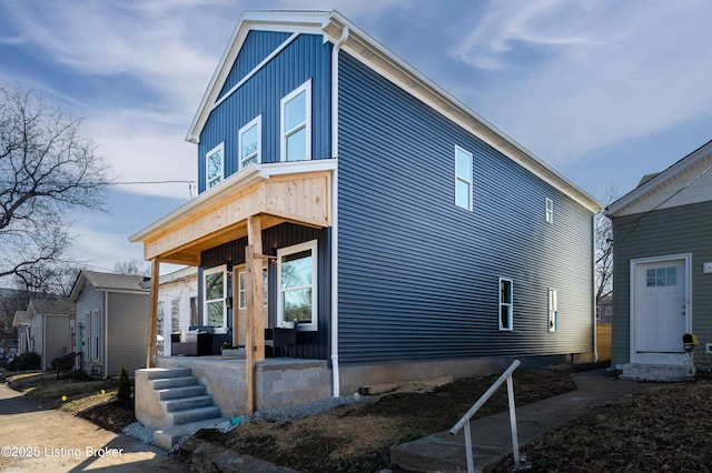 view of front of house featuring covered porch and board and batten siding