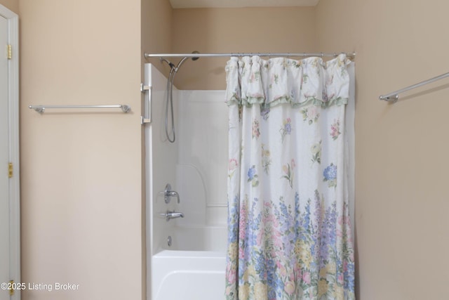 full bath with shower / bathtub combination with curtain