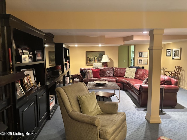 living room featuring decorative columns