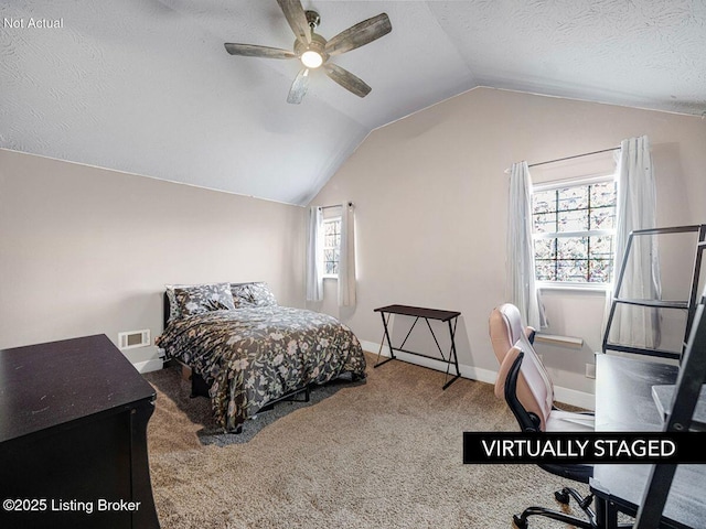 bedroom featuring carpet floors, visible vents, vaulted ceiling, a textured ceiling, and baseboards