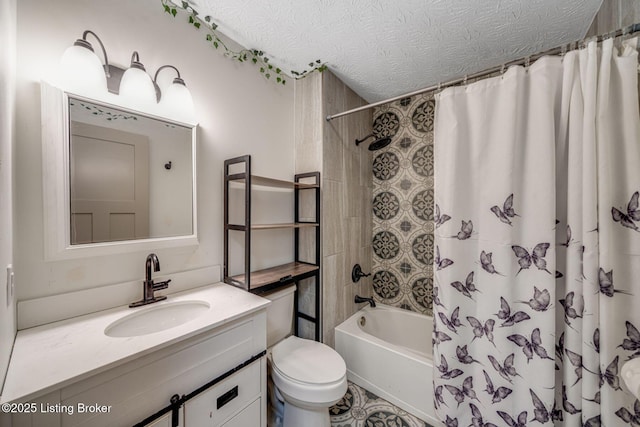 full bathroom featuring a textured ceiling, vanity, toilet, and shower / tub combo with curtain