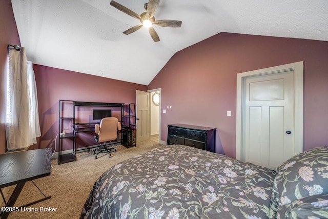 bedroom with baseboards, a ceiling fan, lofted ceiling, a textured ceiling, and carpet flooring