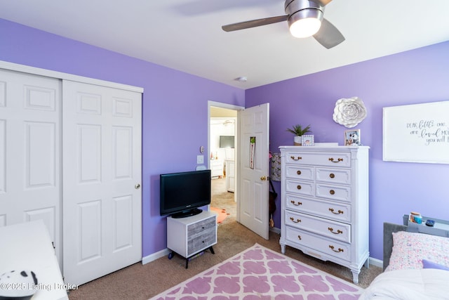 bedroom with carpet floors, a closet, a ceiling fan, and baseboards