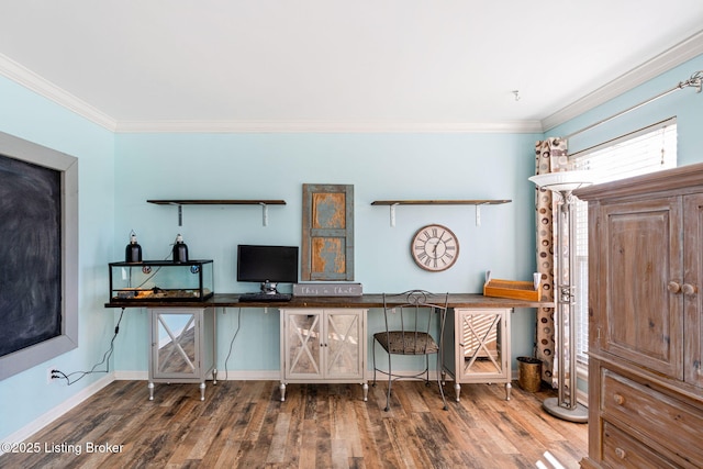 office space featuring ornamental molding, wood finished floors, and baseboards