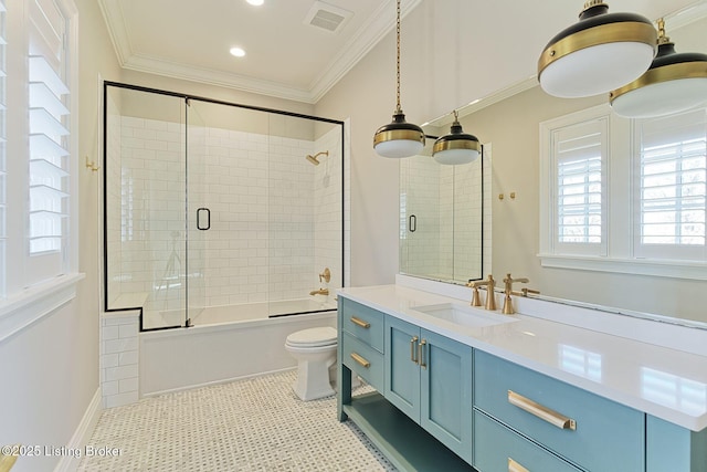 full bathroom featuring ornamental molding, visible vents, toilet, and bath / shower combo with glass door