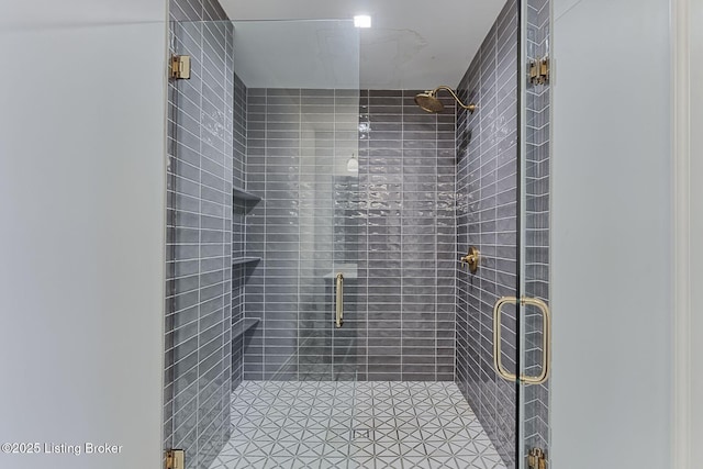 full bathroom with a shower stall